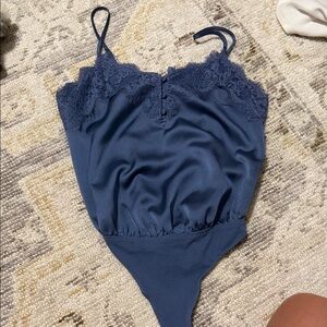 Elegant Lace Trimmed Bodysuit in Navy Blue
